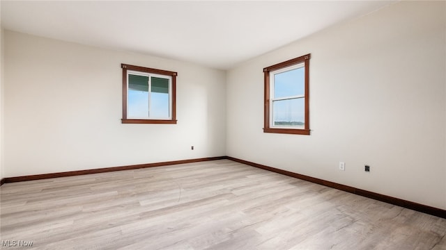 52110 Spencer Rd, Cumberland, OH 43732 - spare room featuring healthy amount of natural light and light wood-style floors