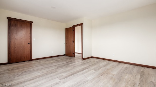 52110 Spencer Rd, Cumberland, OH 43732 - empty room featuring light wood-style floors