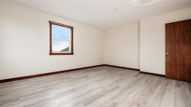 52110 Spencer Rd, Cumberland, OH 43732 - unfurnished room with light wood-style floors and baseboards