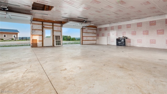 52110 Spencer Rd, Cumberland, OH 43732 - garage featuring a garage door opener