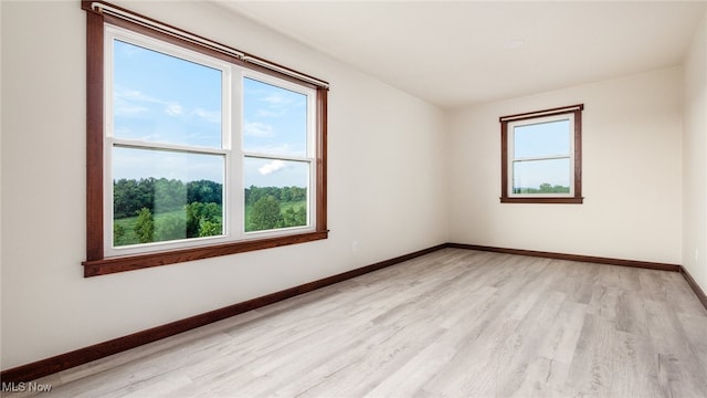 52110 Spencer Rd, Cumberland, OH 43732 - unfurnished room featuring light wood-style flooring and baseboards