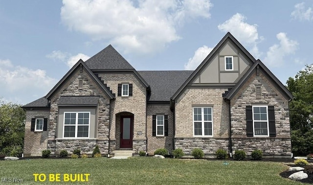 5084 Neptune Oval, Solon, OH 44139 - view of front of property with stone siding, a front yard, stucco siding, and roof with shingles