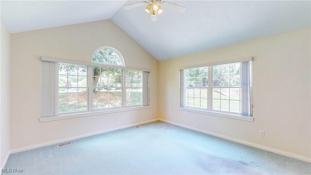 8531 Creekside Dr, Sagamore Hills, OH 44067 - spare room featuring a ceiling fan, carpet floors, and lofted ceiling