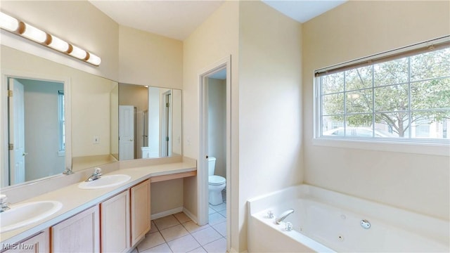 8531 Creekside Dr, Sagamore Hills, OH 44067 - bathroom featuring a tub with jets, double vanity, and tile patterned floors