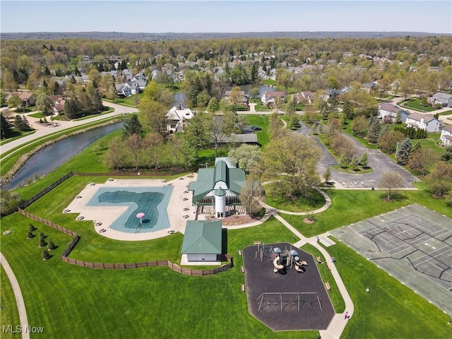 8531 Creekside Dr, Sagamore Hills, OH 44067 - aerial view of property and surrounding area with a pool and a large body of water