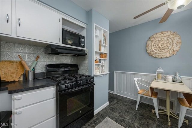 1492 Ries St, Barberton, OH 44203 - kitchen with black appliances, a ceiling fan, white cabinetry, backsplash, and under cabinet range hood