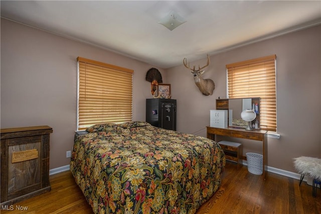 1492 Ries St, Barberton, OH 44203 - bedroom featuring wood finished floors and baseboards