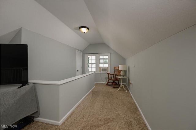 1492 Ries St, Barberton, OH 44203 - corridor with vaulted ceiling and carpet flooring