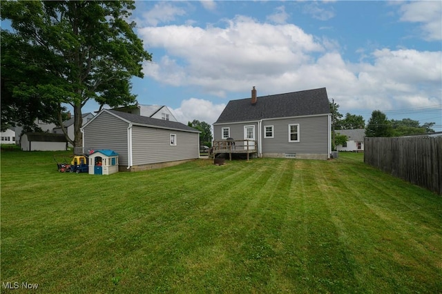 1492 Ries St, Barberton, OH 44203 - back of house with a chimney and a wooden deck