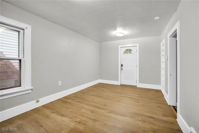 523 Gage St, Akron, OH 44311 - foyer with plenty of natural light and light wood finished floors