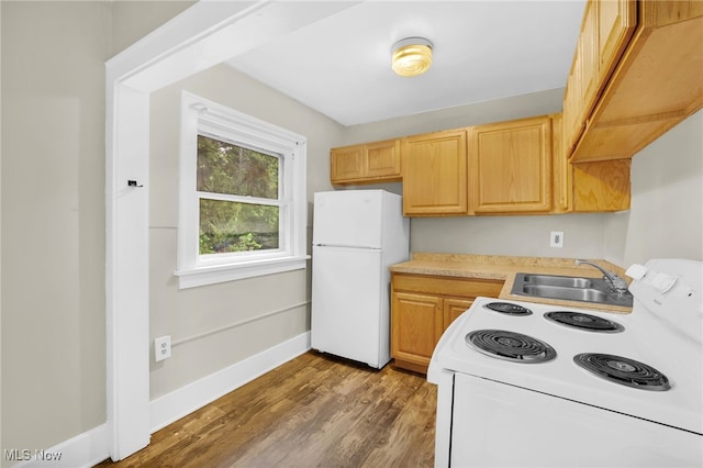 523 Gage St, Akron, OH 44311 - kitchen featuring white appliances, light countertops, wood finished floors, premium range hood, and light brown cabinets