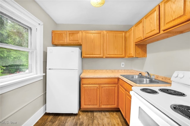 523 Gage St, Akron, OH 44311 - kitchen featuring white appliances, light countertops, and wood finished floors