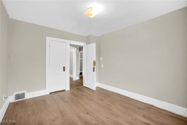523 Gage St, Akron, OH 44311 - empty room featuring light wood-type flooring and baseboards