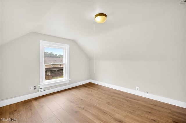 523 Gage St, Akron, OH 44311 - bonus room featuring wood finished floors and vaulted ceiling