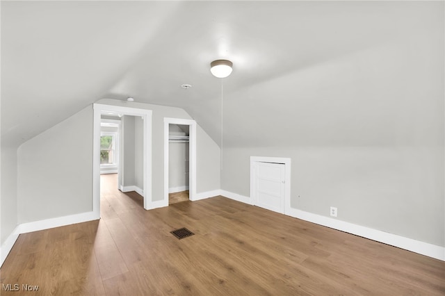 523 Gage St, Akron, OH 44311 - additional living space with wood finished floors and lofted ceiling