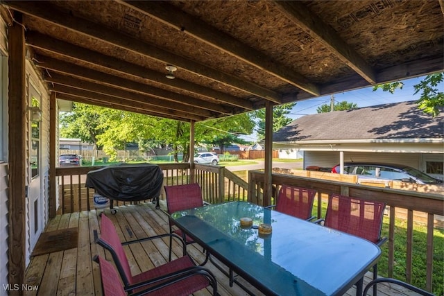 135 S 31st St, Newark, OH 43055 - wooden terrace with outdoor dining area and a grill