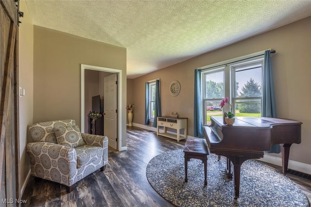135 S 31st St, Newark, OH 43055 - living area featuring wood finished floors and a textured ceiling