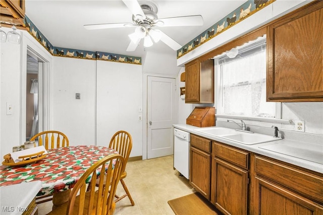 192 Swartz Rd, Akron, OH 44319 - kitchen with a ceiling fan, brown cabinetry, light countertops, and dishwasher