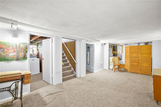 192 Swartz Rd, Akron, OH 44319 - finished basement featuring a textured ceiling, stairway, washer / dryer, and carpet floors