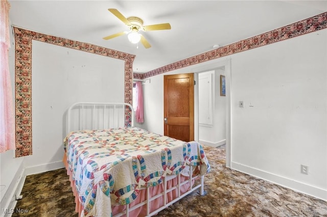 192 Swartz Rd, Akron, OH 44319 - carpeted bedroom with baseboards and a ceiling fan
