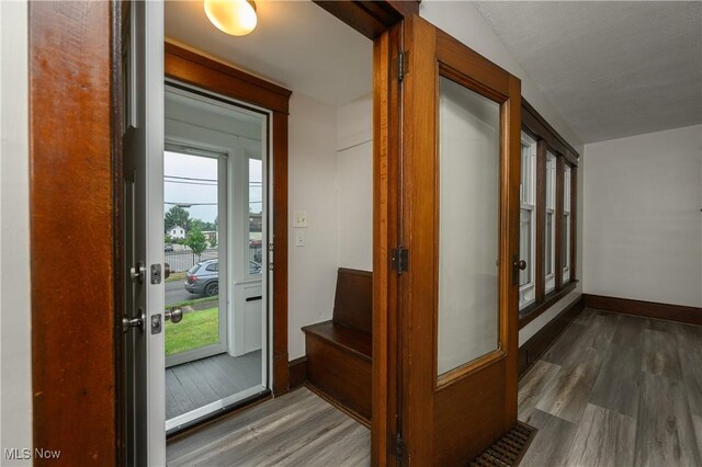 41 New St, Barberton, OH 44203 - entrance foyer featuring wood finished floors and baseboards