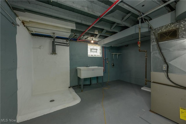 41 New St, Barberton, OH 44203 - below grade area with heating unit and a sink