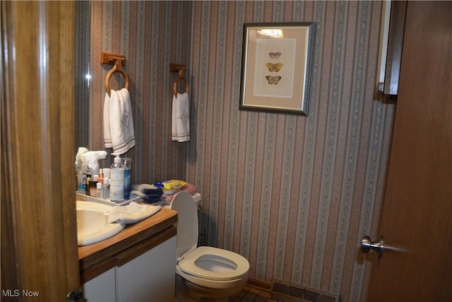 8303 Bradfords Gate Rd, Olmsted Falls, OH 44138 - half bath featuring vanity and tile patterned floors