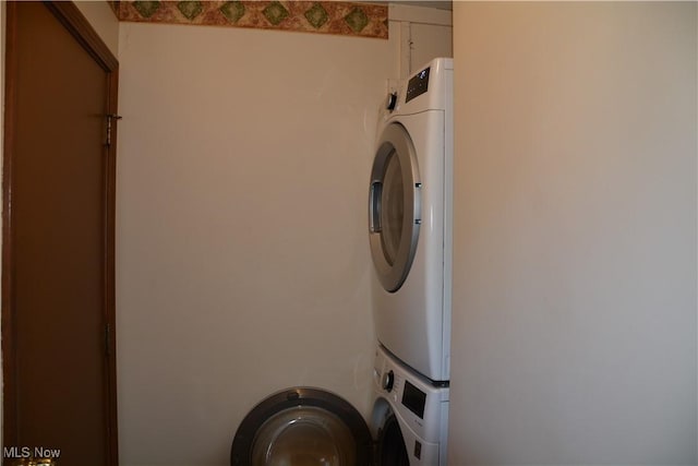 8303 Bradfords Gate Rd, Olmsted Falls, OH 44138 - laundry area featuring stacked washing machine and dryer
