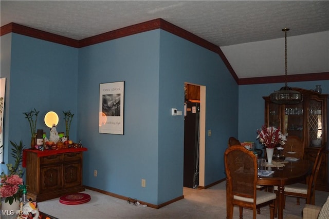 8303 Bradfords Gate Rd, Olmsted Falls, OH 44138 - dining room with carpet flooring, a textured ceiling, lofted ceiling, and crown molding