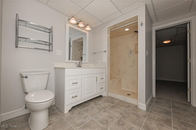 1137 Saint Abigail St SW, Hartville, OH 44632 - full bathroom with vanity, a drop ceiling, a marble finish shower, and tile patterned flooring