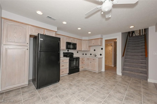 1137 Saint Abigail St SW, Hartville, OH 44632 - kitchen featuring light brown cabinetry, black appliances, ceiling fan, recessed lighting, and light countertops