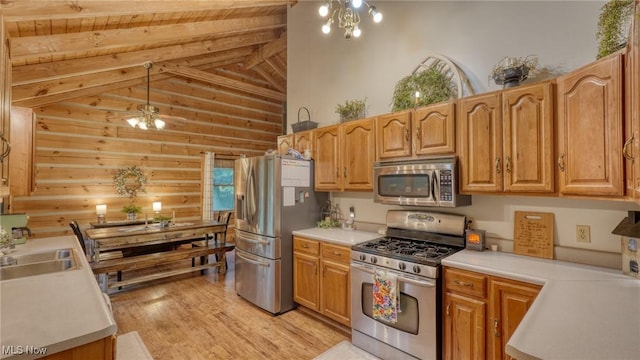 48820 Hillcrest Dr, Caldwell, OH 43724 - kitchen featuring appliances with stainless steel finishes, beamed ceiling, light wood finished floors, light countertops, and ceiling fan