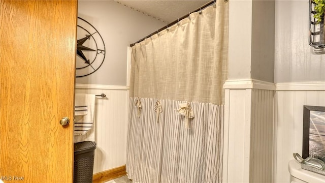 48820 Hillcrest Dr, Caldwell, OH 43724 - bathroom with a wainscoted wall