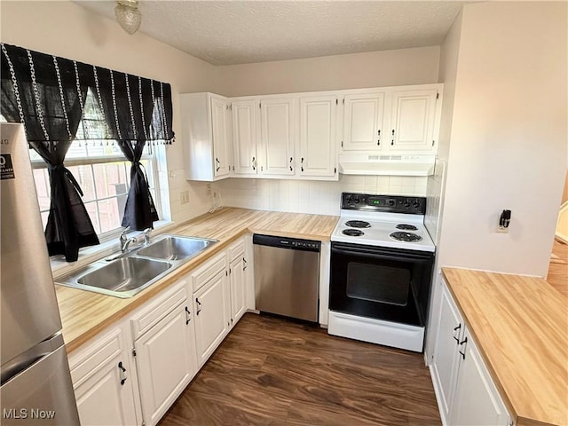 1489 Munroe Falls Ave, Cuyahoga Falls, OH 44221 - kitchen featuring wood counters, electric range oven, fridge, stainless steel dishwasher, and premium range hood