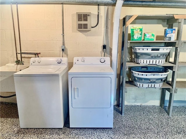 1489 Munroe Falls Ave, Cuyahoga Falls, OH 44221 - laundry room with washing machine and clothes dryer and concrete block wall