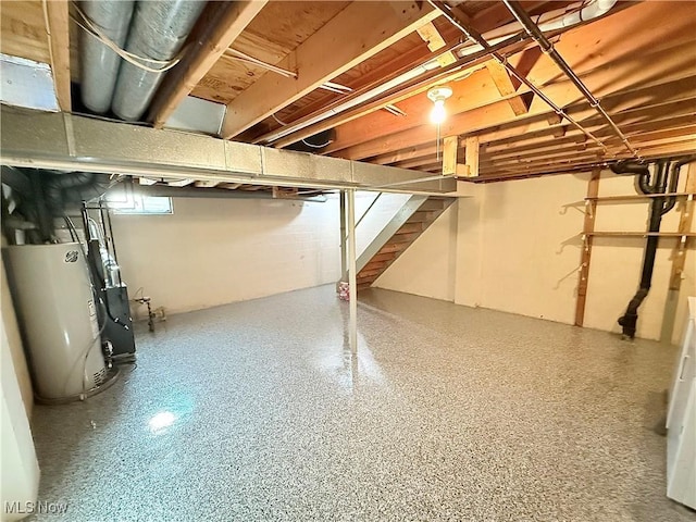 1489 Munroe Falls Ave, Cuyahoga Falls, OH 44221 - below grade area featuring stairway and gas water heater