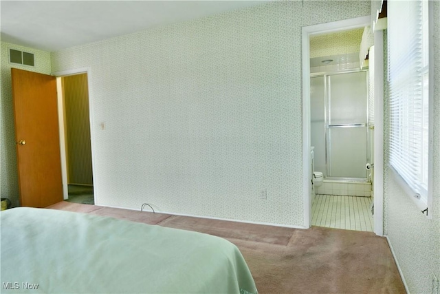 2741 Citadel Dr NE, Warren, OH 44483 - bedroom with wallpapered walls, connected bathroom, and carpet floors
