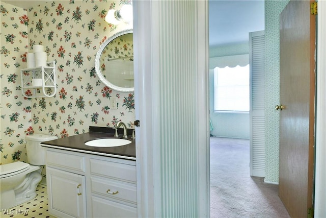 2741 Citadel Dr NE, Warren, OH 44483 - bathroom featuring wallpapered walls and vanity