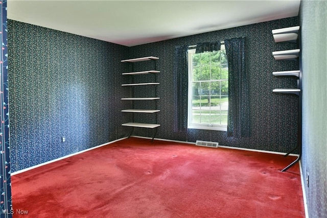 2741 Citadel Dr NE, Warren, OH 44483 - carpeted spare room with healthy amount of natural light and wallpapered walls