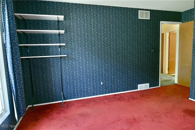 2741 Citadel Dr NE, Warren, OH 44483 - carpeted spare room featuring wallpapered walls