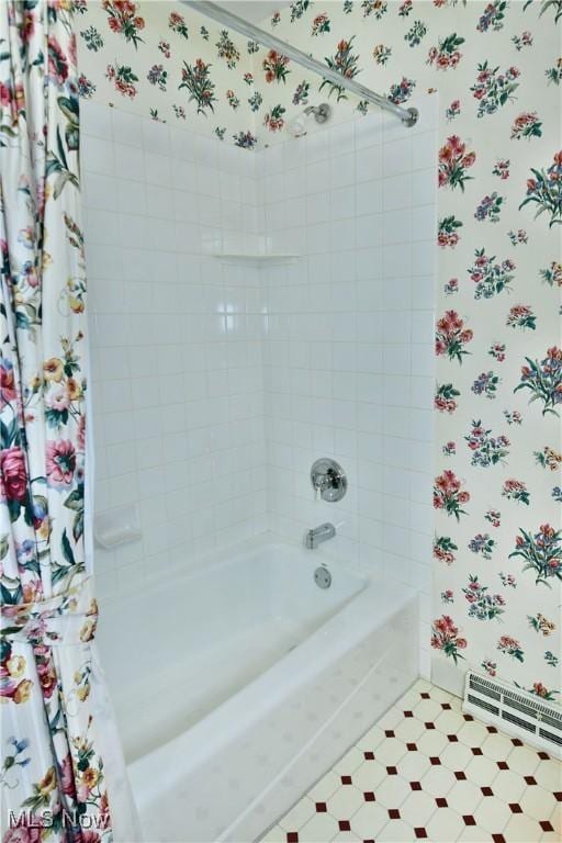 2741 Citadel Dr NE, Warren, OH 44483 - bathroom with wallpapered walls, shower / bath combo with shower curtain, and a baseboard heating unit