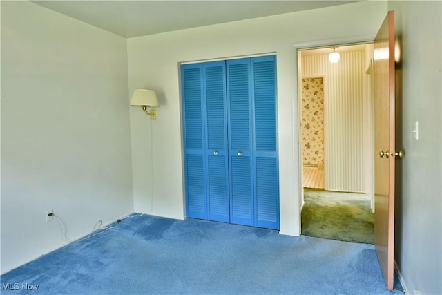 2741 Citadel Dr NE, Warren, OH 44483 - unfurnished bedroom with carpet and a closet