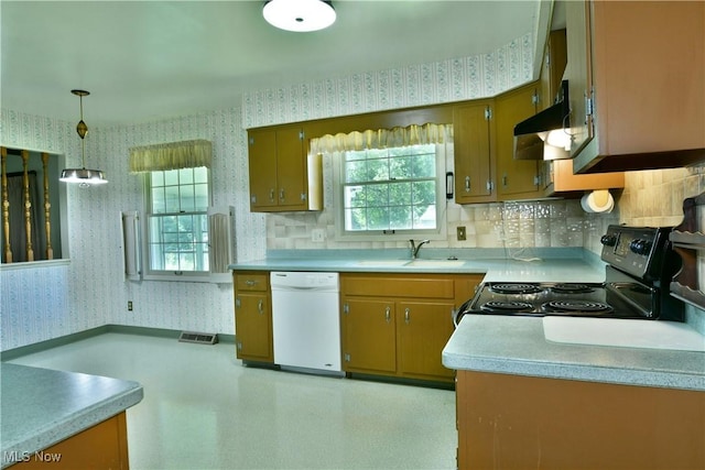 2741 Citadel Dr NE, Warren, OH 44483 - kitchen with wallpapered walls, black electric range oven, light countertops, white dishwasher, and under cabinet range hood
