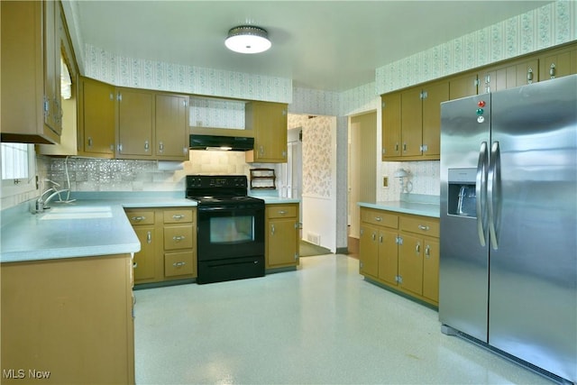 2741 Citadel Dr NE, Warren, OH 44483 - kitchen featuring wallpapered walls, stainless steel fridge, electric range, tasteful backsplash, and light countertops