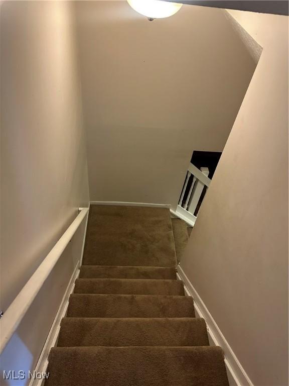 6279 Palmer Dr NW, Canton, OH 44718 - staircase featuring carpet flooring and baseboards