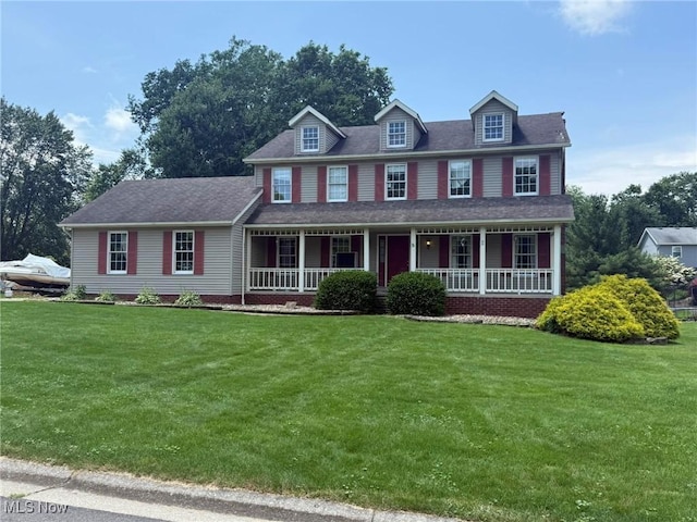 6279 Palmer Dr NW, Canton, OH 44718 - colonial inspired home featuring a porch and a front lawn