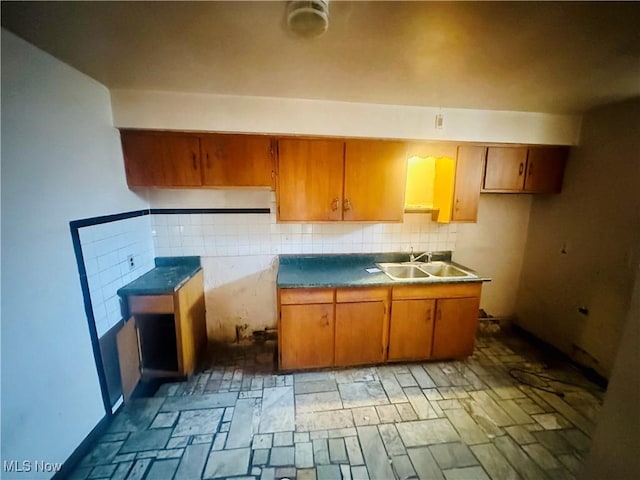 668 Virginia Ave, Follansbee, WV 26037 - kitchen with brown cabinets and tasteful backsplash