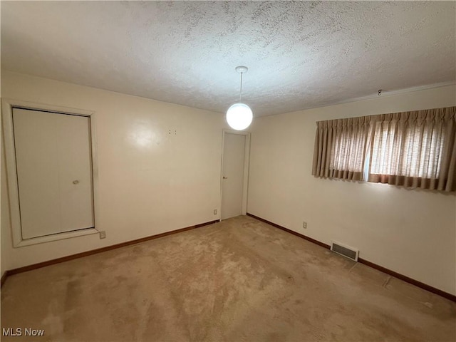 668 Virginia Ave, Follansbee, WV 26037 - unfurnished room featuring light colored carpet and a textured ceiling