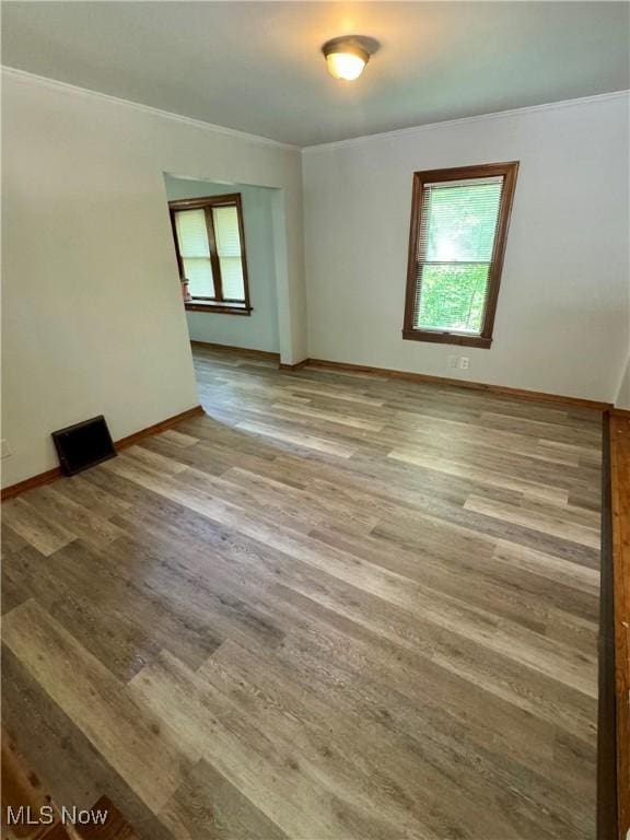 348 Jewell Dr, Akron, OH 44311 - empty room with crown molding and wood finished floors