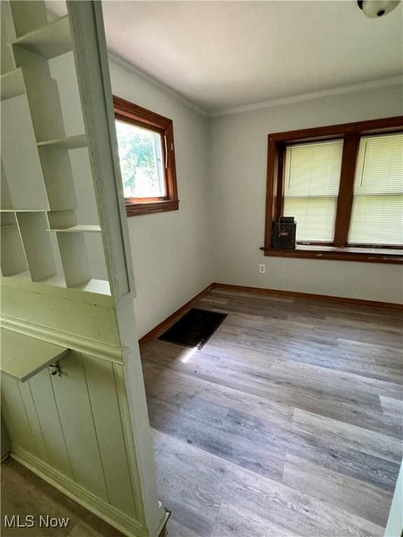 348 Jewell Dr, Akron, OH 44311 - empty room with crown molding and wood finished floors